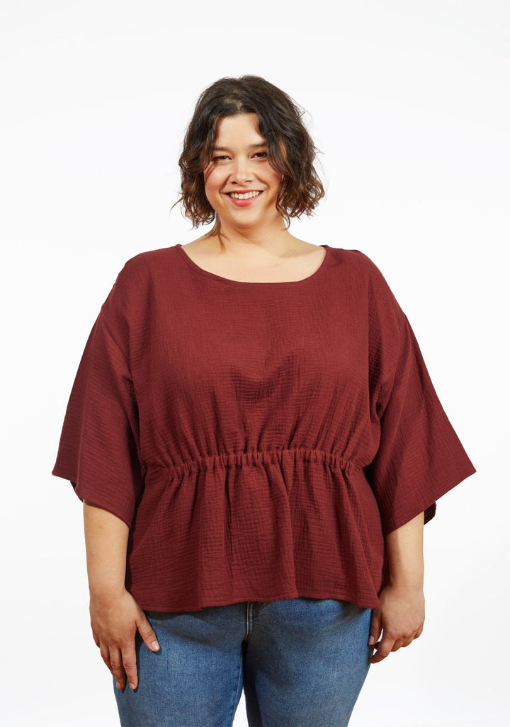 Grainline Studio Corbin Top sewing pattern for sizes 14–32, featuring ruffled cap and 3/4-length sleeve options.