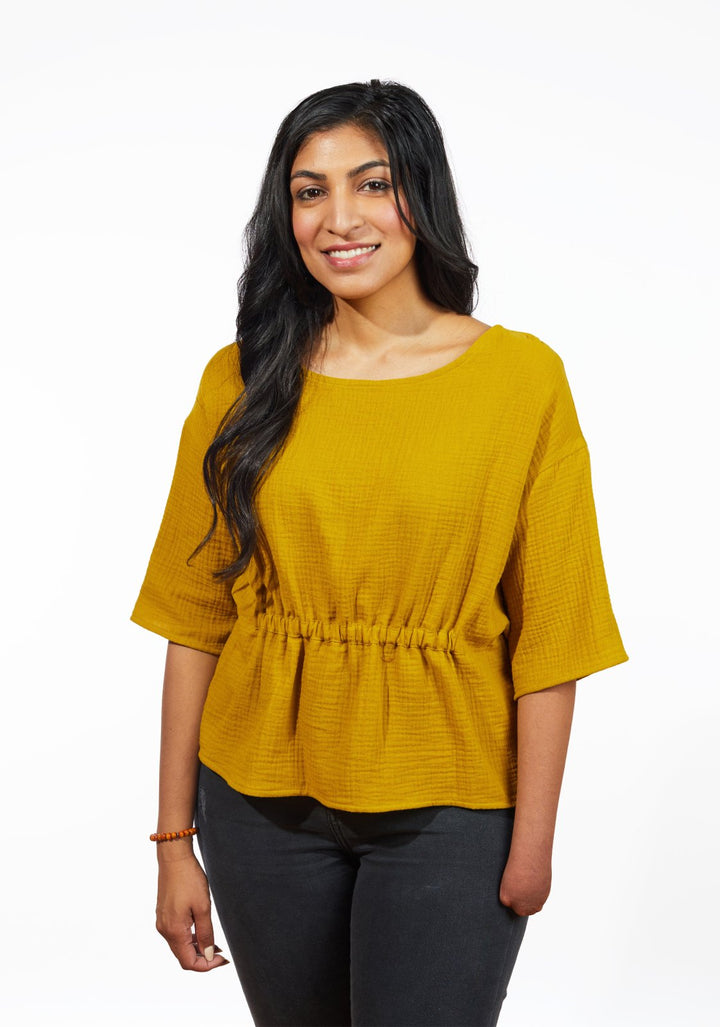 Grainline Studio Corbin Top sewing pattern for sizes 0–18, featuring ruffled cap and 3/4-length sleeve options.