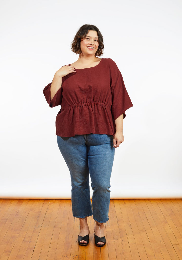 Grainline Studio Corbin Top sewing pattern for sizes 14–32, featuring ruffled cap and 3/4-length sleeve options.