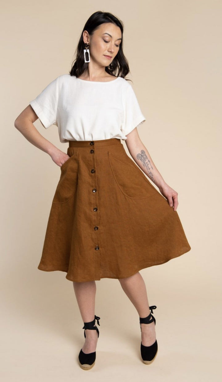 Closet Core Fiore Skirt sewing pattern – high-waisted A-line skirt with three variations including wrap, button-front, and classic flare