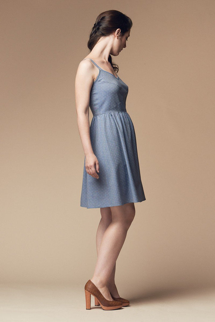 Deer and Doe Centauree Dress sewing pattern with double straps, geometric paneled bodice, above-knee or high-low hem, sizes 34–46