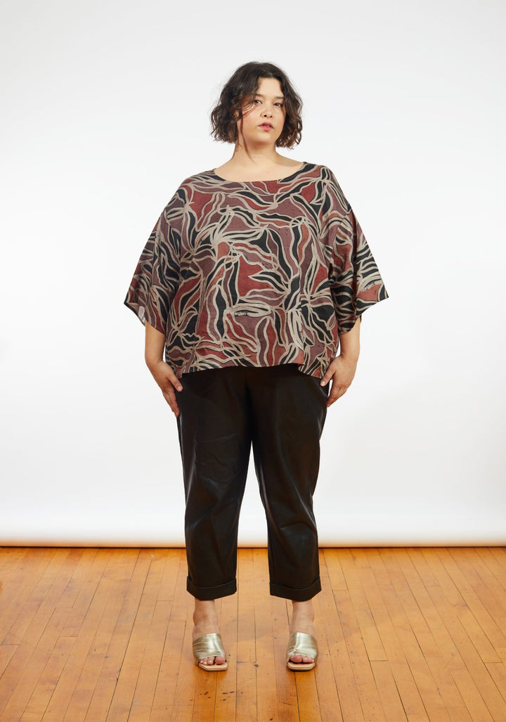 Grainline Studio Corbin Top sewing pattern for sizes 14–32, featuring ruffled cap and 3/4-length sleeve options.