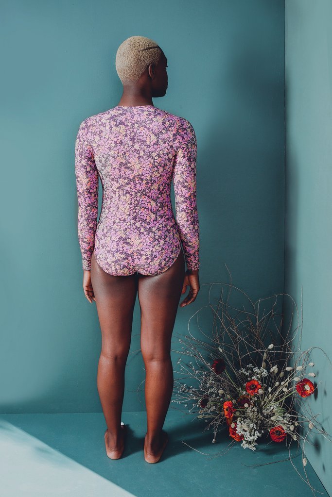 Friday Pattern Co. Seabright Swimmer one-piece swimsuit pattern with optional sleeves, plunging neckline, lace-up closure, sizes XS–4X