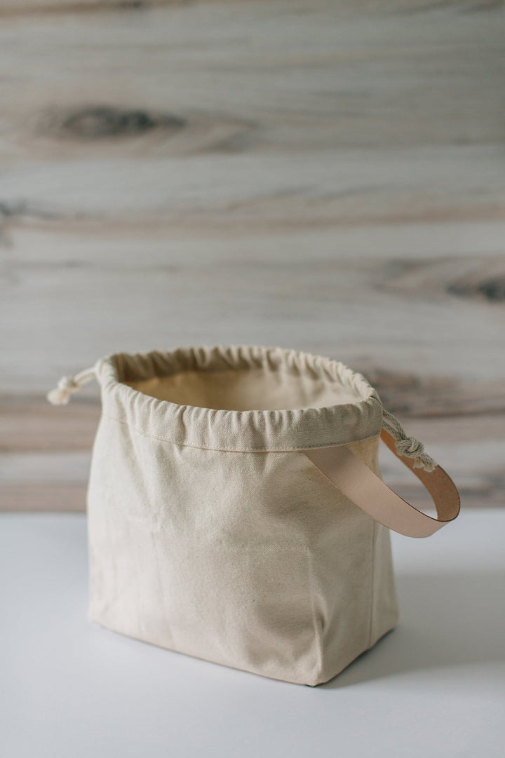 Grainline Studio Field Bag sewing pattern for DIY craft storage tote with pockets and grommets