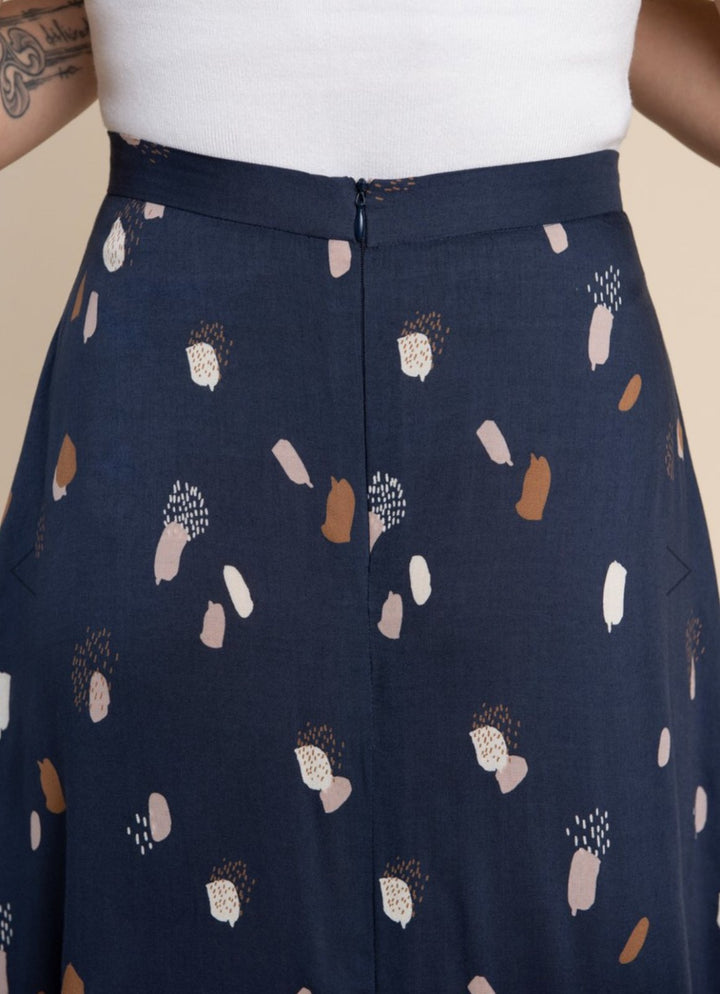 Closet Core Fiore Skirt sewing pattern – high-waisted A-line skirt with three variations including wrap, button-front, and classic flare