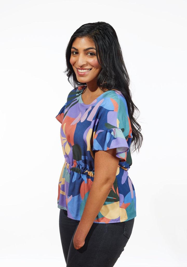 Grainline Studio Corbin Top sewing pattern for sizes 0–18, featuring ruffled cap and 3/4-length sleeve options.