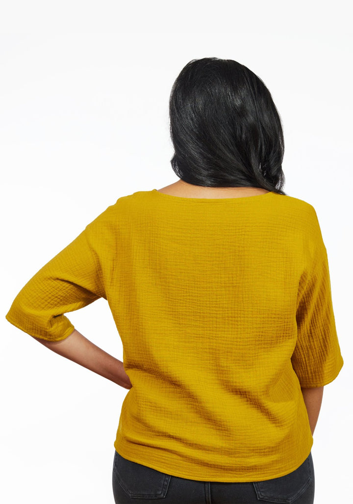 Grainline Studio Corbin Top sewing pattern for sizes 0–18, featuring ruffled cap and 3/4-length sleeve options.