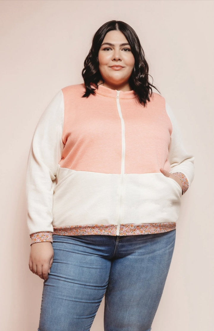 Friday Pattern Co Arlo Track Jacket sewing pattern in knit fabric with sporty collar and front pockets