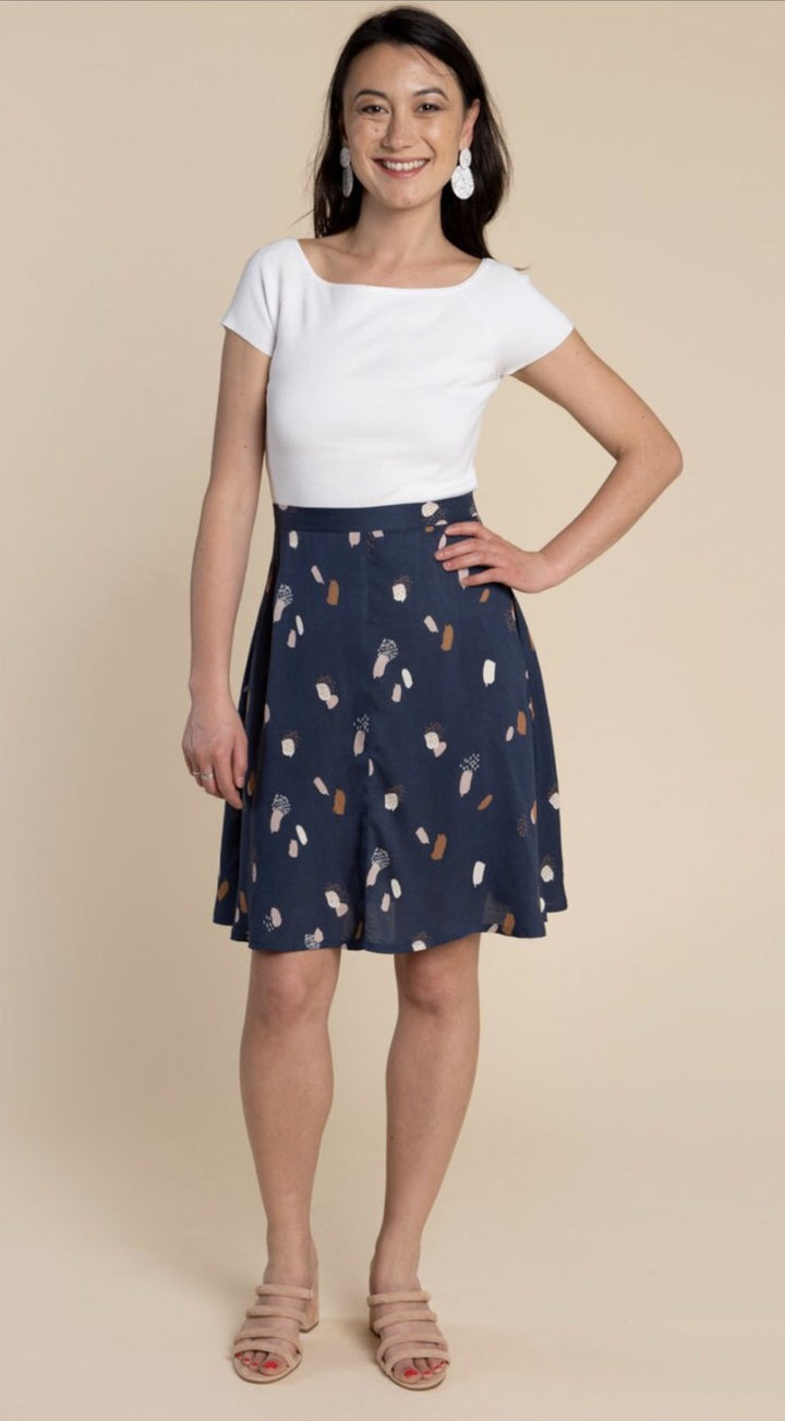 Closet Core Fiore Skirt sewing pattern – high-waisted A-line skirt with three variations including wrap, button-front, and classic flare