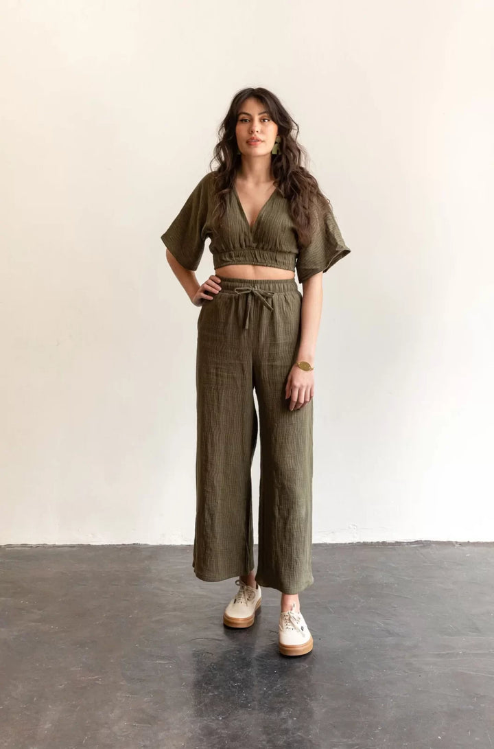Friday Pattern Co. Saguaro Set sewing pattern featuring flowy pants with pockets and a reversible V-neck pullover top, sizes XS–7X.