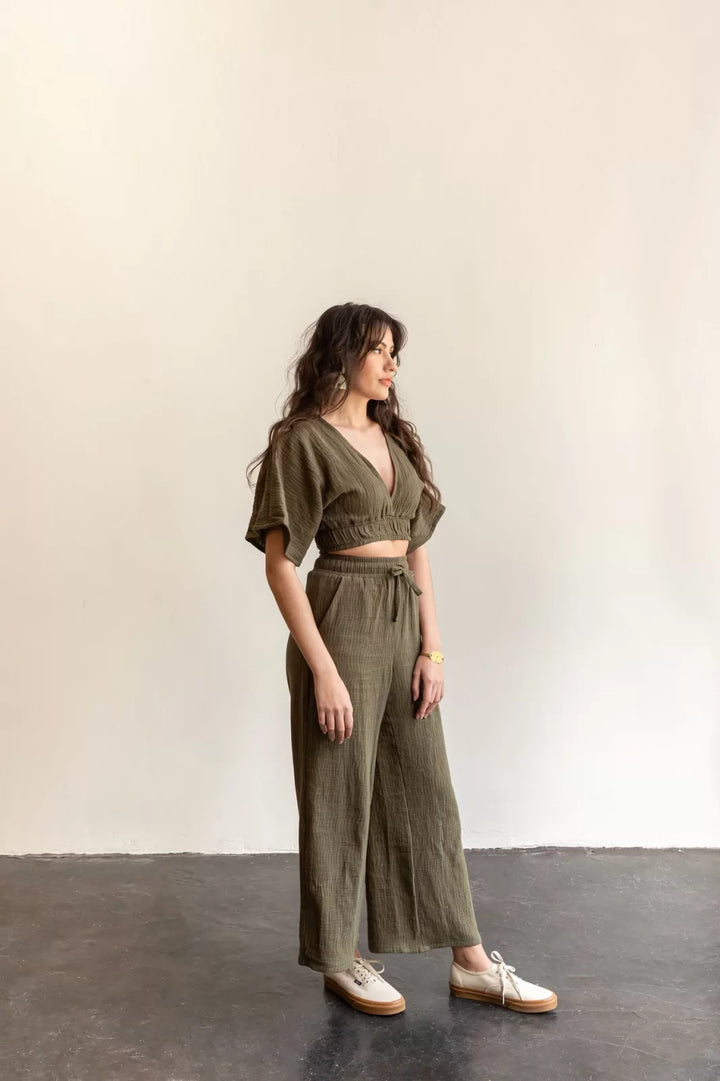 Friday Pattern Co. Saguaro Set sewing pattern featuring flowy pants with pockets and a reversible V-neck pullover top, sizes XS–7X.