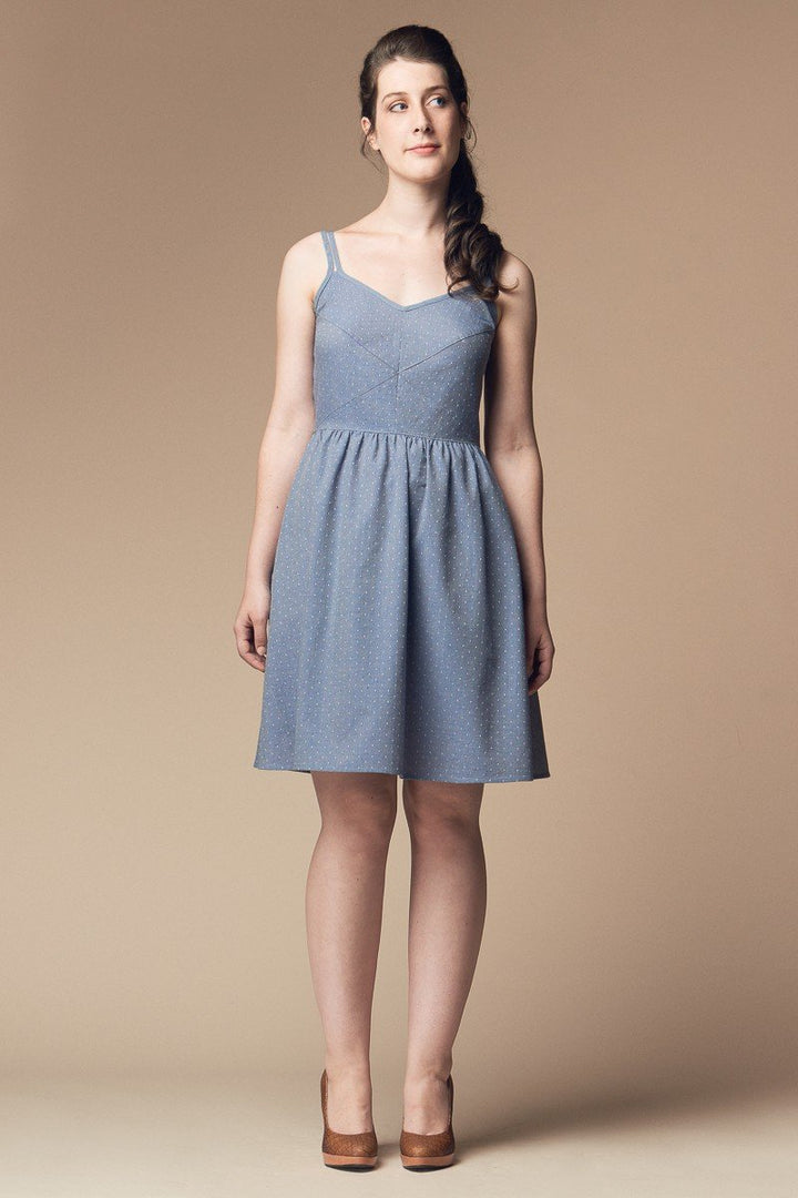 Deer and Doe Centauree Dress sewing pattern with double straps, geometric paneled bodice, above-knee or high-low hem, sizes 34–46