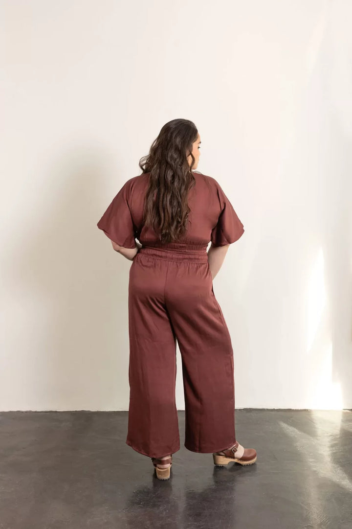 Friday Pattern Co. Saguaro Set sewing pattern featuring flowy pants with pockets and a reversible V-neck pullover top, sizes XS–7X.