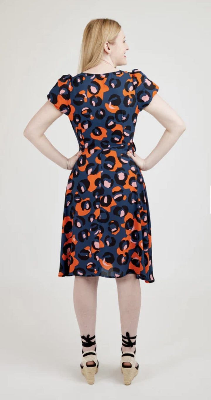 Cashmerette Roseclair Dress sewing pattern with wrap design, three sleeve and skirt variations, and curve-friendly fit in sizes 0–32.