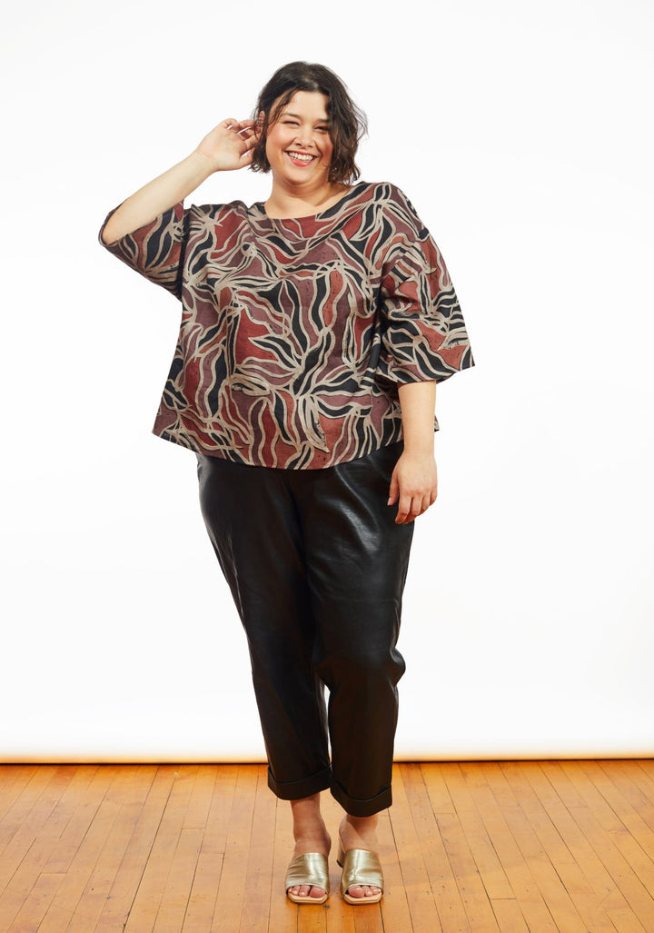 Grainline Studio Corbin Top sewing pattern for sizes 14–32, featuring ruffled cap and 3/4-length sleeve options.