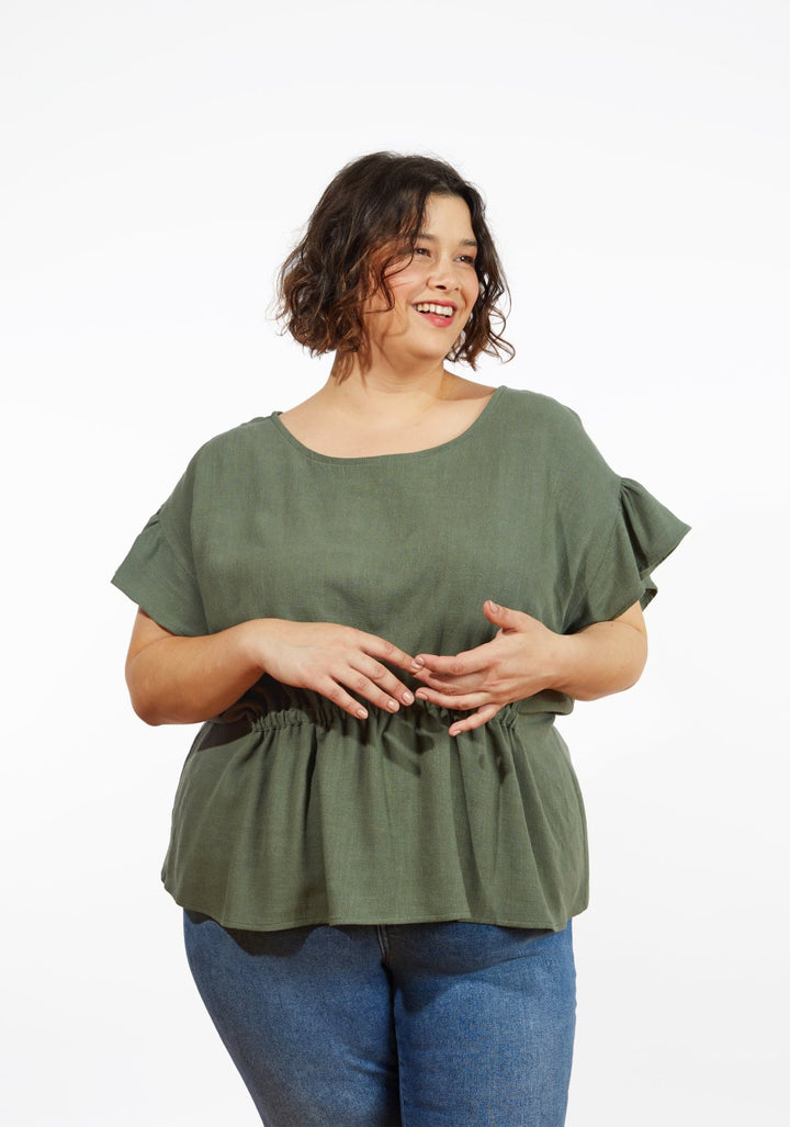Grainline Studio Corbin Top sewing pattern for sizes 14–32, featuring ruffled cap and 3/4-length sleeve options.