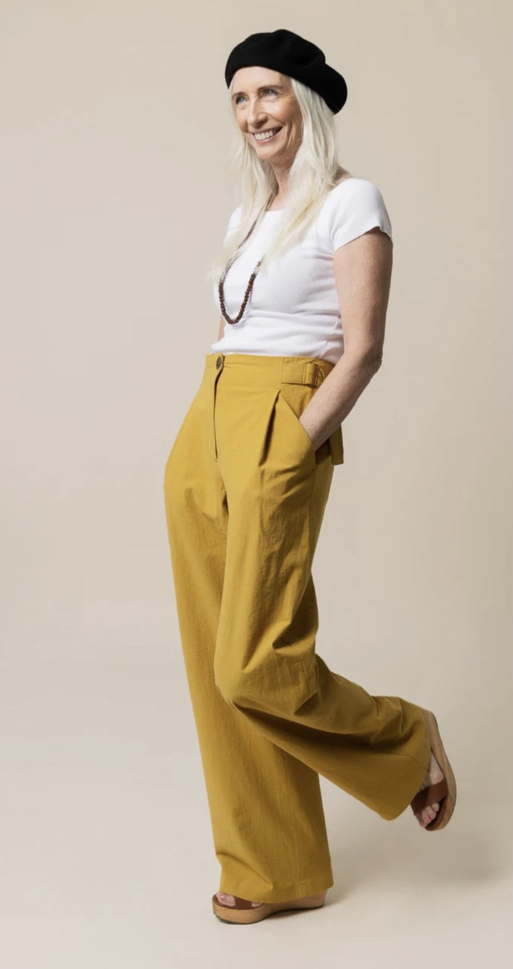 Create elegant, high-waisted pleated trousers with the Closet Core Mitchell Pattern. Featuring deep front pleats, angled pockets, tapered or wide-leg options, and optional waist tie, this sewing pattern is perfect for polished everyday wear.