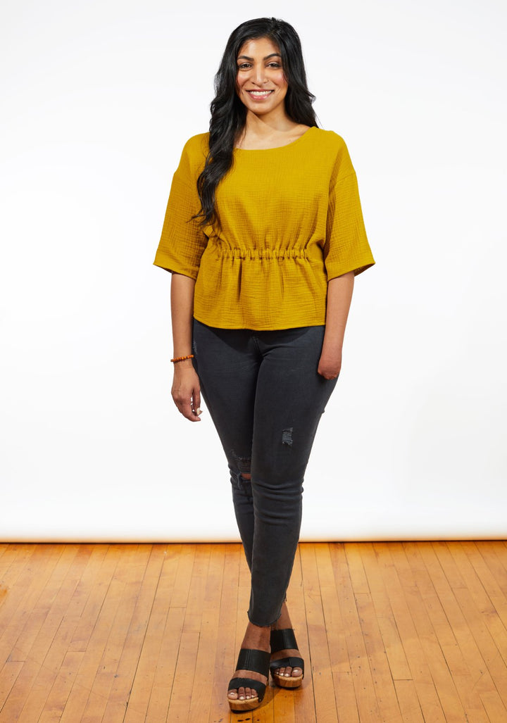 Grainline Studio Corbin Top sewing pattern for sizes 0–18, featuring ruffled cap and 3/4-length sleeve options.