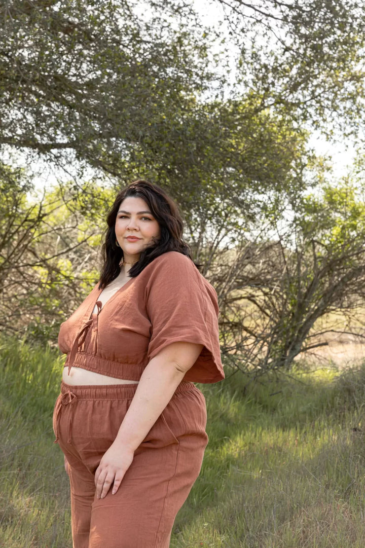 Friday Pattern Co. Saguaro Set sewing pattern featuring flowy pants with pockets and a reversible V-neck pullover top, sizes XS–7X.