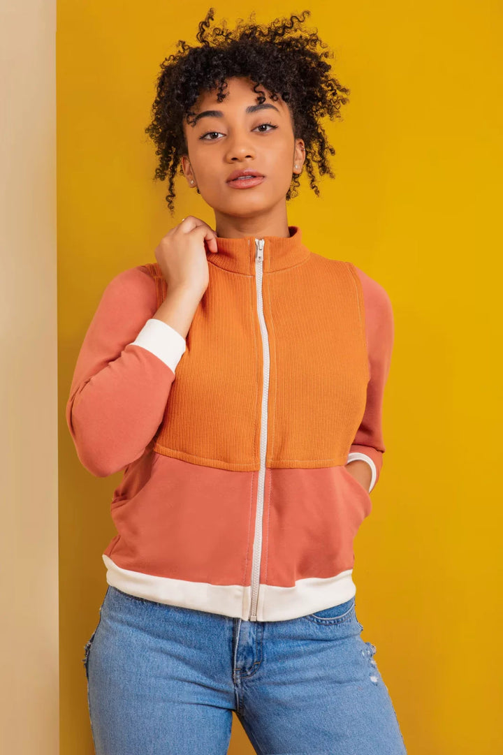 Friday Pattern Co Arlo Track Jacket sewing pattern in knit fabric with sporty collar and front pockets