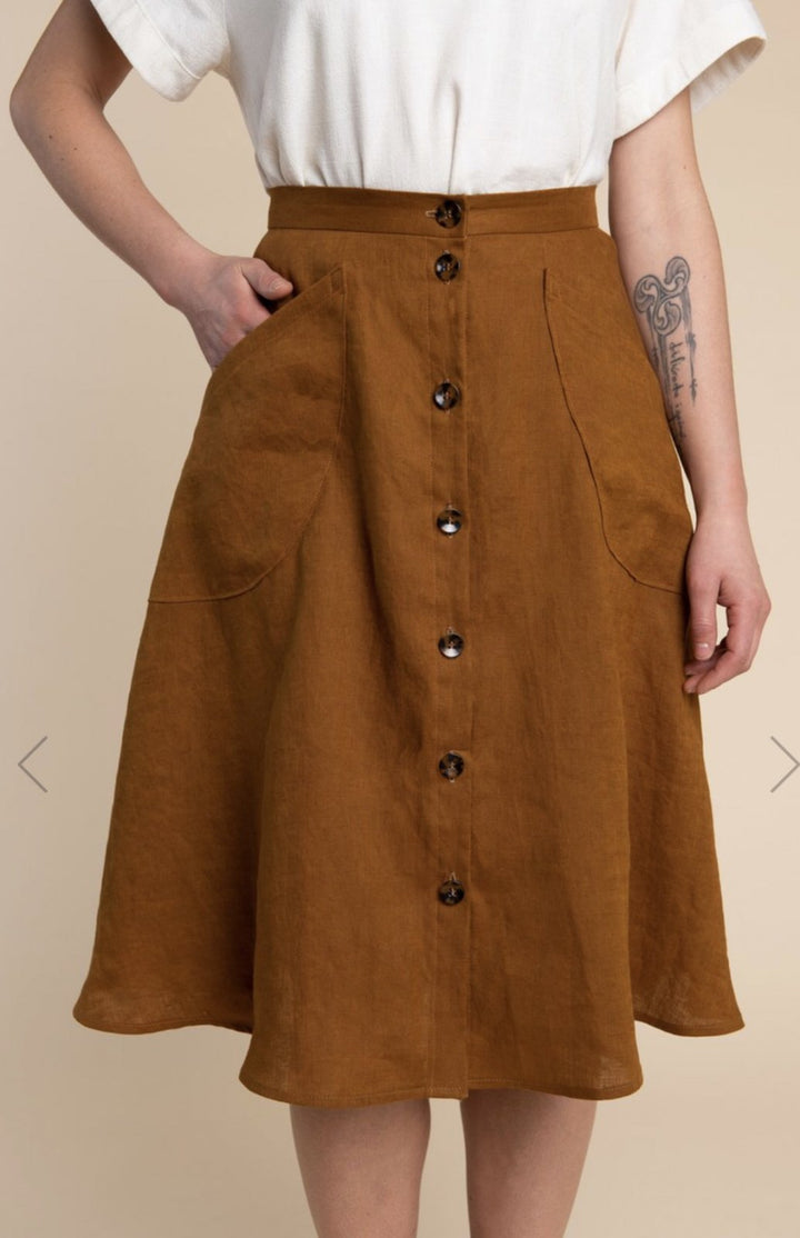 Closet Core Fiore Skirt sewing pattern – high-waisted A-line skirt with three variations including wrap, button-front, and classic flare