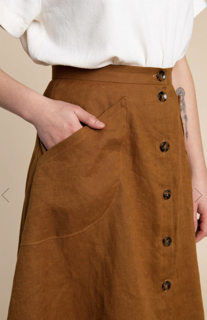 Closet Core Fiore Skirt sewing pattern – high-waisted A-line skirt with three variations including wrap, button-front, and classic flare