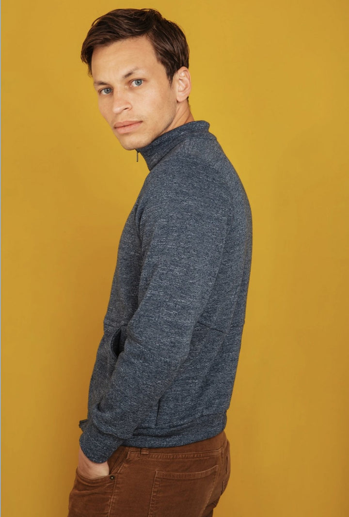 Friday Pattern Co Arlo Track Jacket sewing pattern in knit fabric with sporty collar and front pockets