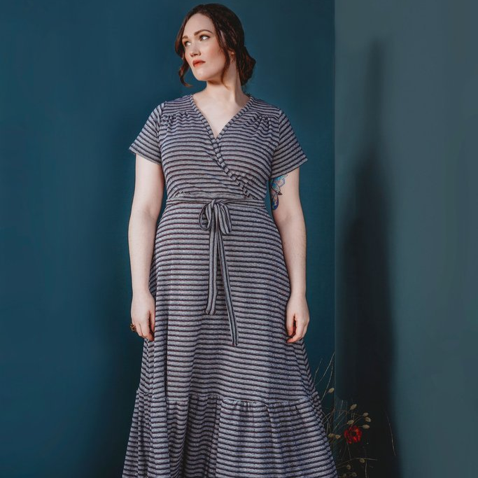 Friday Pattern Co. Westcliff Dress sewing pattern with faux wrap front, A-line skirt, optional gathered tier, tie belt, and sizes XS–4X