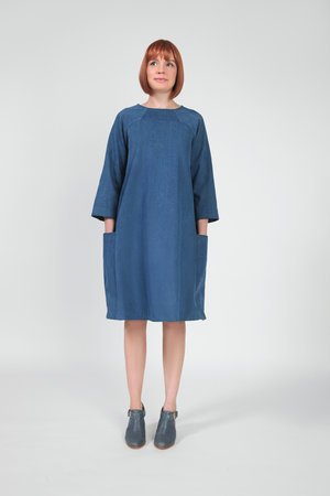 In the Folds Rushcutter Dress sewing pattern – oversized A-line dress with two style variations and illustrated instructions.