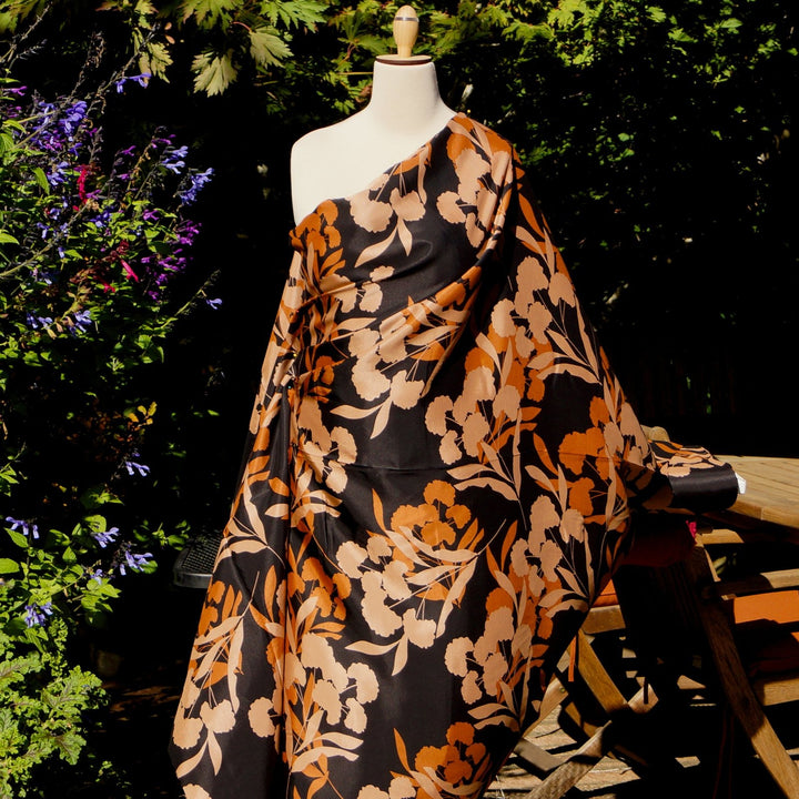 Rayon Viscose Satin Twill Sunset Floral fabric in glossy satin finish with sunset-inspired floral pattern, 58-inch wide