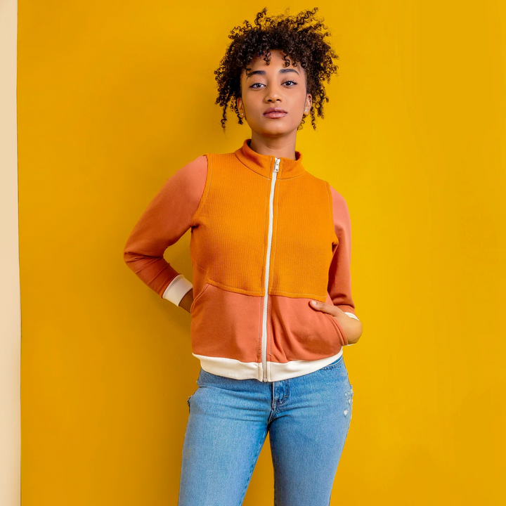 Friday Pattern Co Arlo Track Jacket sewing pattern in knit fabric with sporty collar and front pockets