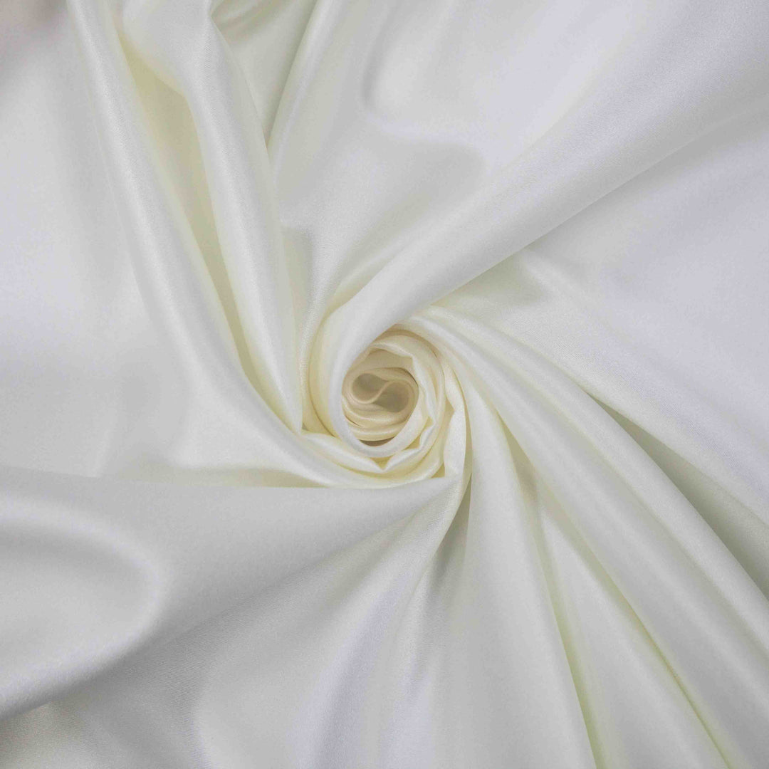 Ivory satin and silk fabric for bridal sewing at Sewing Studio Fabrics