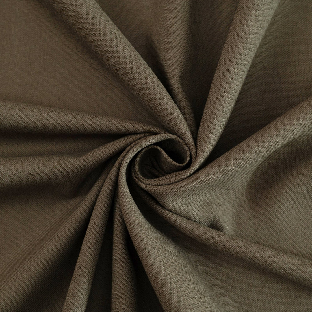 Olive green laundered linen fabric, pre-washed for softness and elegant drape