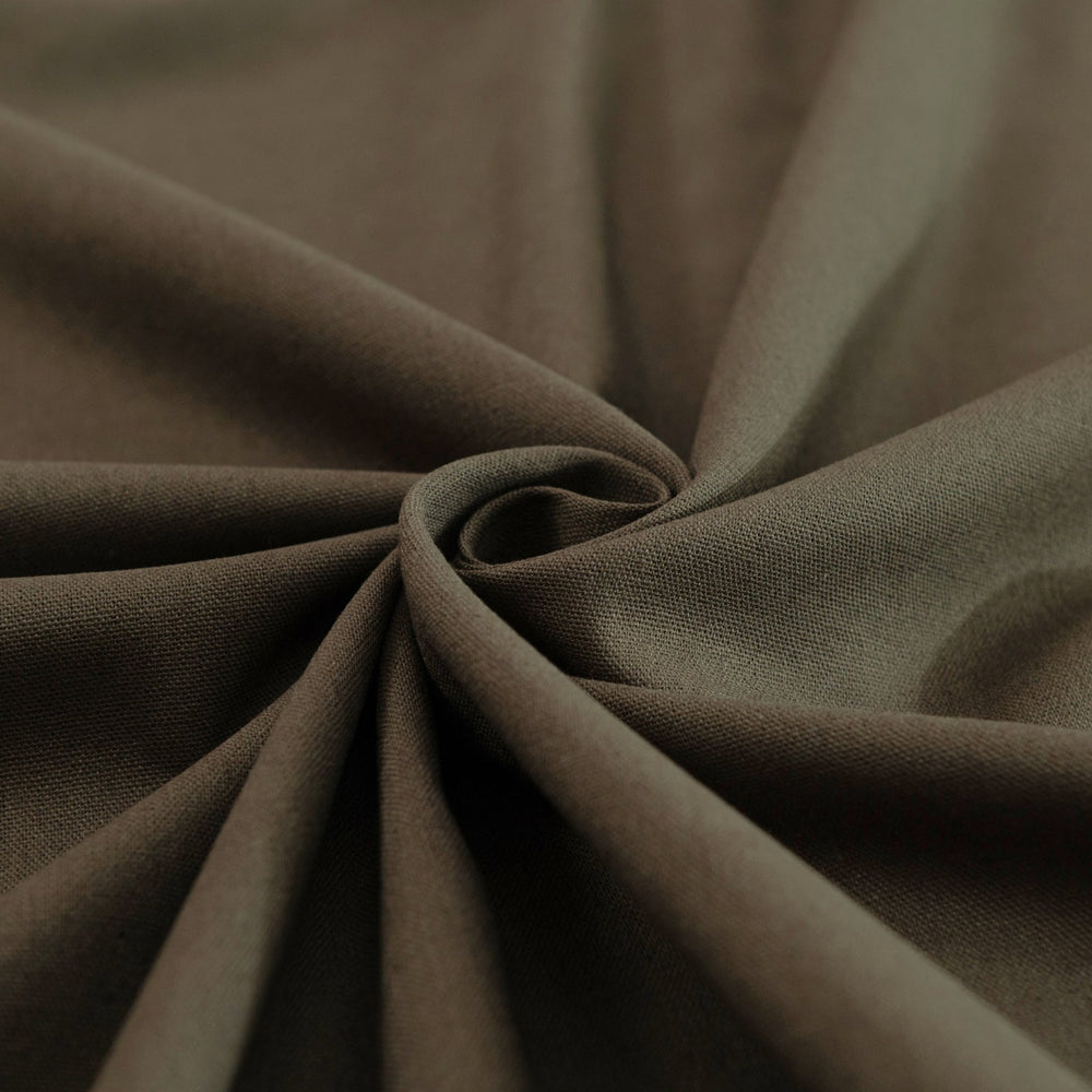 Olive green laundered linen fabric, pre-washed for softness and elegant drape