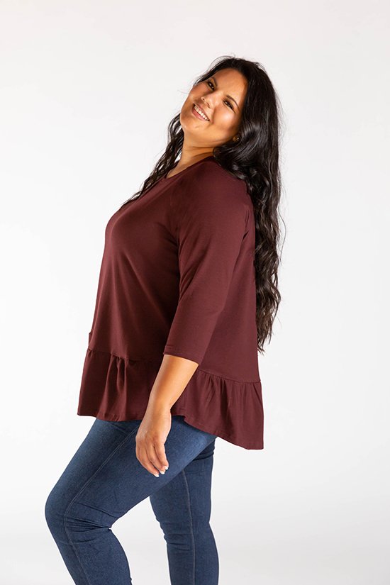 Chalk & Notch Waterfall Raglan sewing pattern with cropped, ruffle top, and ruffle dress options