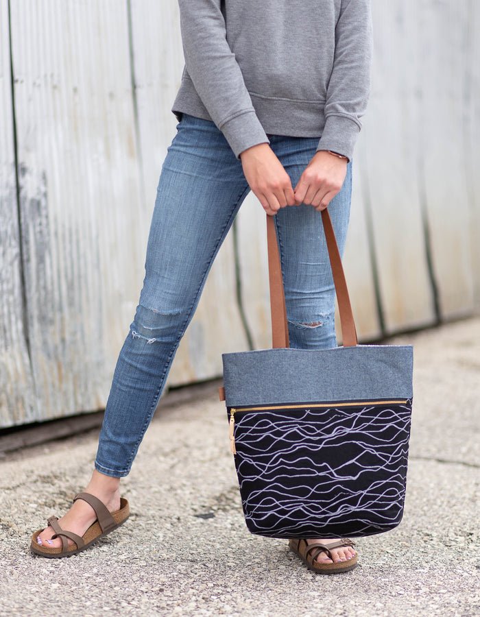 Noodlehead Caravan Tote and Pouch sewing pattern for DIY knitting bag with zippered pockets and matching accessory