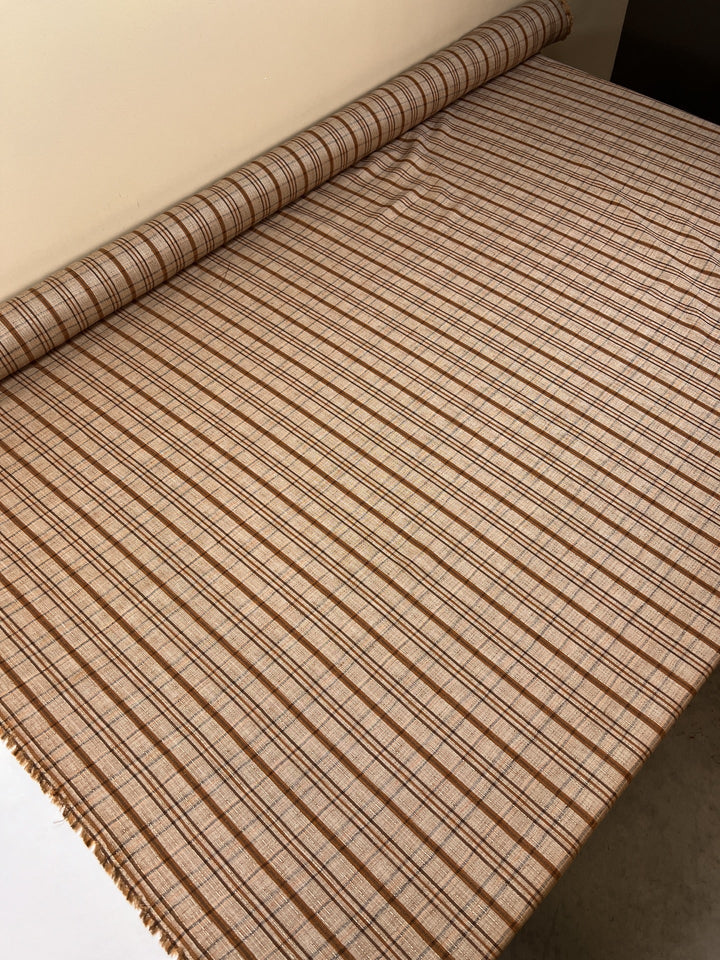 Italian plaid tweed fabric in browns and beige, viscose cotton blend, lightweight textile for structured coats, suiting, skirts, and dresses.