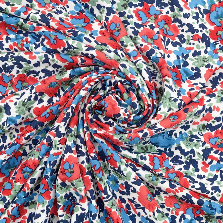 Rayon Taylor Twill Bold Garden fabric – lightweight rayon twill with vibrant floral print on white base for dresses and blouses