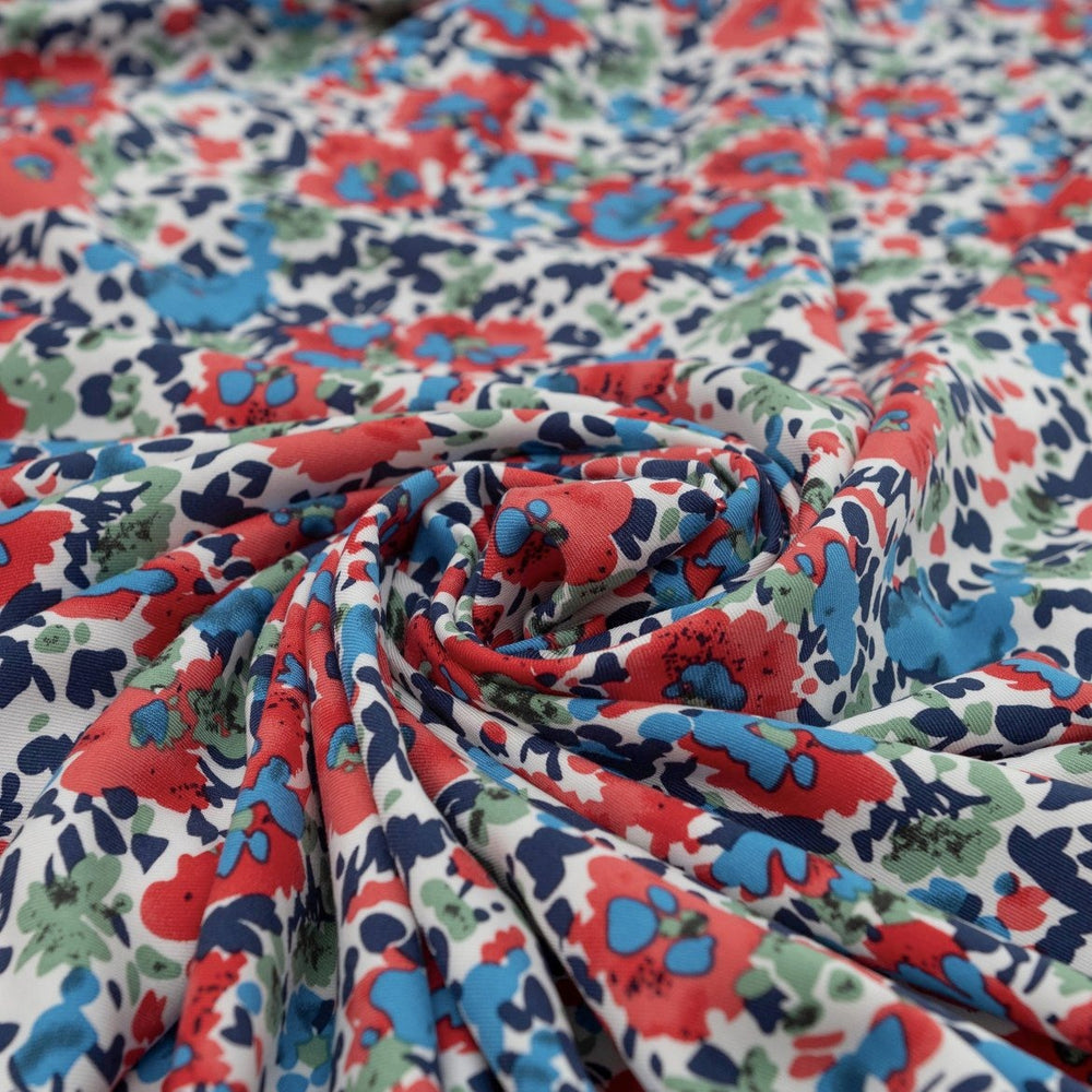 Rayon Taylor Twill Bold Garden fabric – lightweight rayon twill with vibrant floral print on white base for dresses and blouses