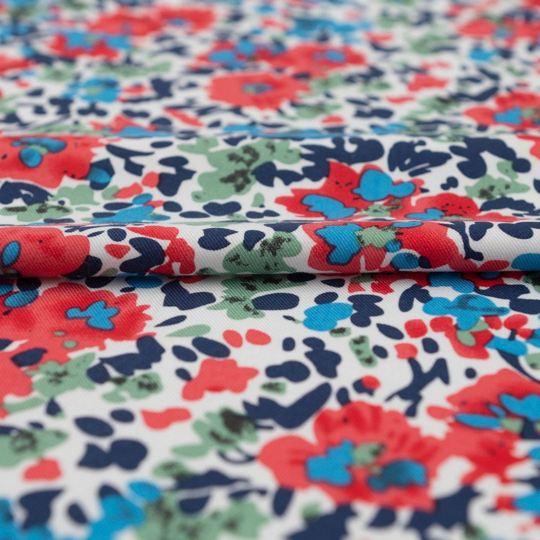 Rayon Taylor Twill Bold Garden fabric – lightweight rayon twill with vibrant floral print on white base for dresses and blouses