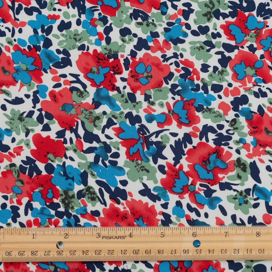 Rayon Taylor Twill Bold Garden fabric – lightweight rayon twill with vibrant floral print on white base for dresses and blouses