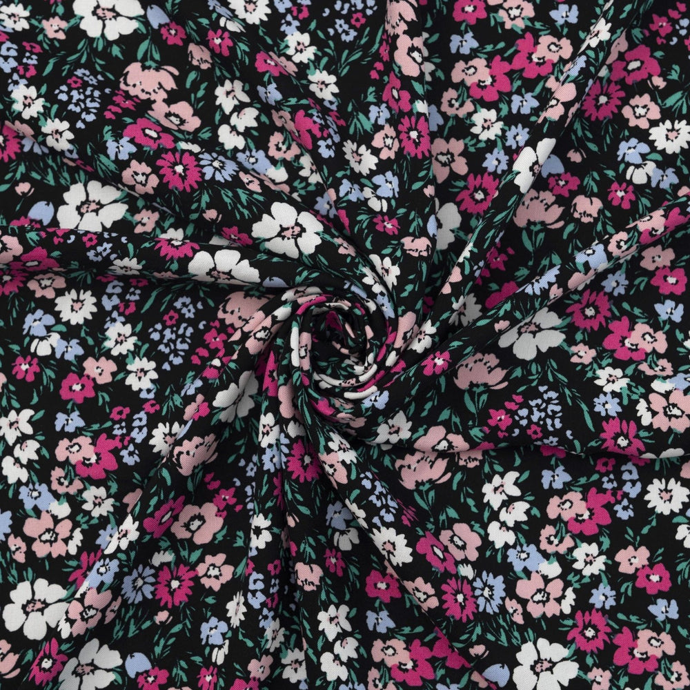 Rayon Challis fabric in Black Night Floral with pastel blooms, 54-inch wide, lightweight and flowy.