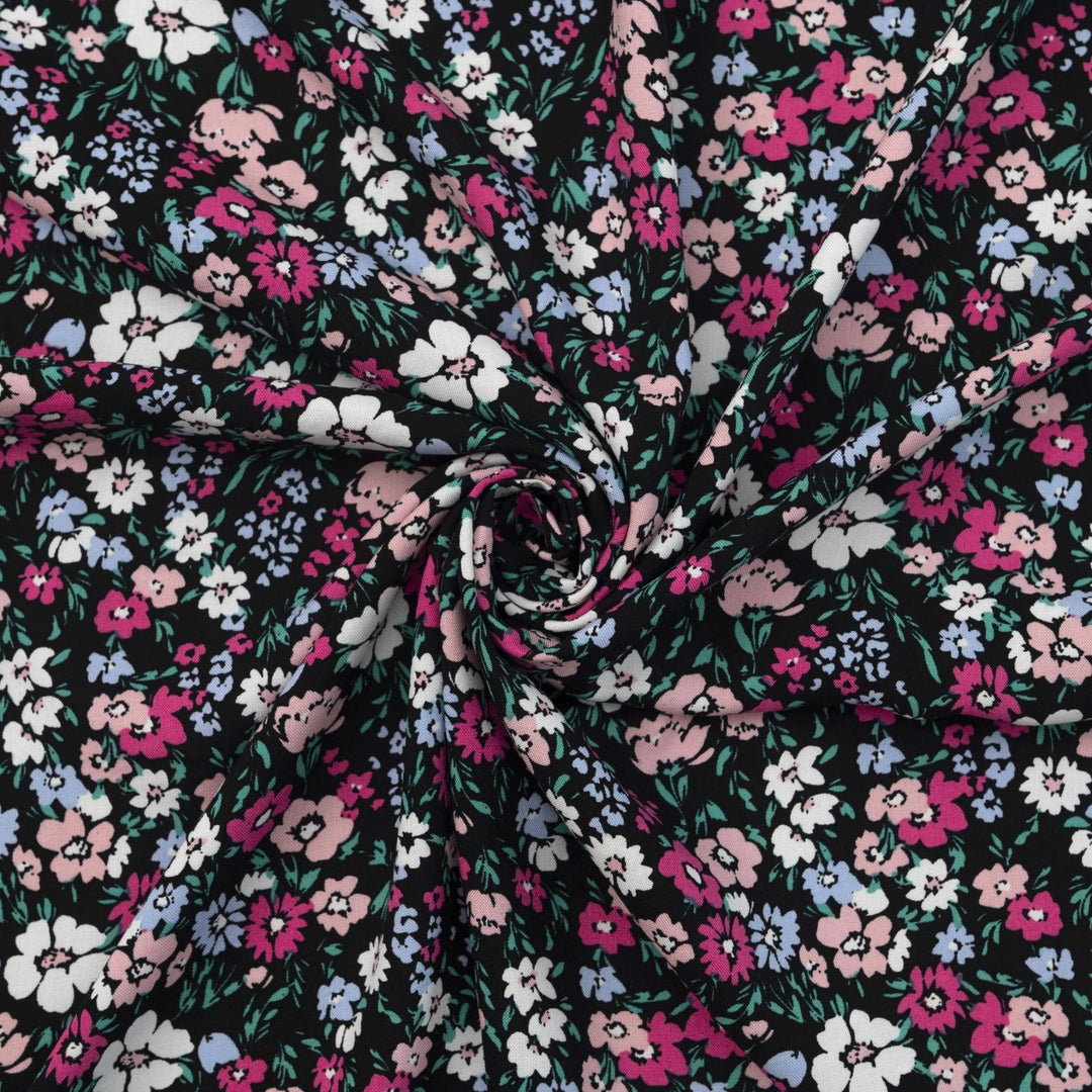Rayon Challis fabric in Black Night Floral with pastel blooms, 54-inch wide, lightweight and flowy.