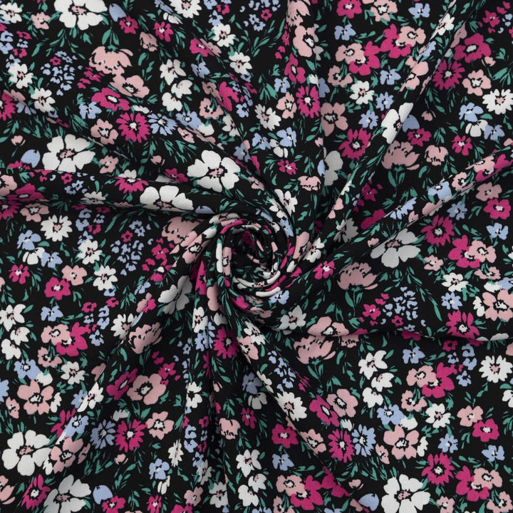 Rayon Challis fabric in Black Night Floral with pastel blooms, 54-inch wide, lightweight and flowy.