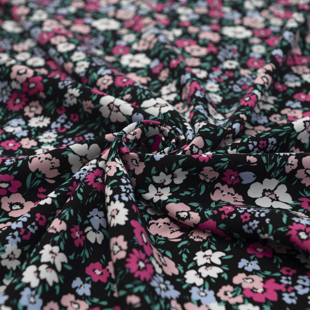 Rayon Challis fabric in Black Night Floral with pastel blooms, 54-inch wide, lightweight and flowy.