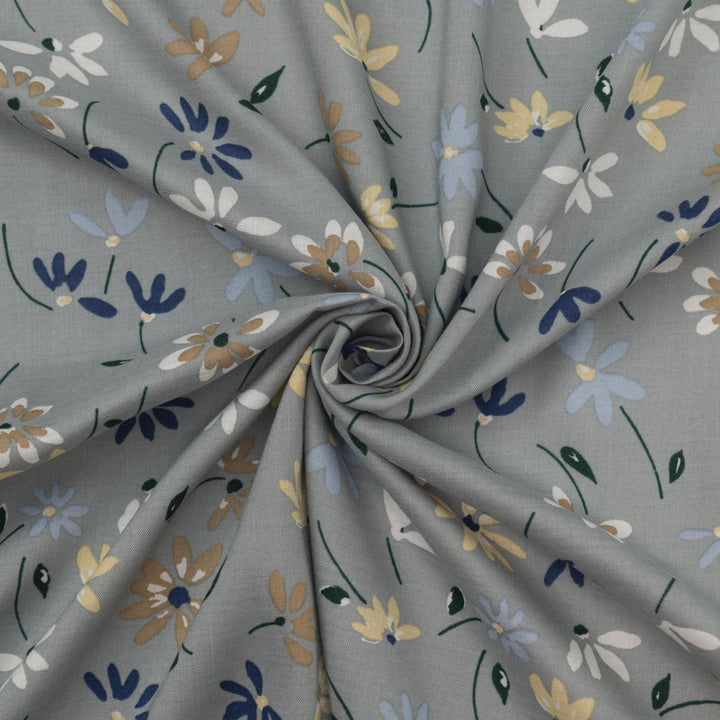 Rayon Challis fabric pale blue with delicate daisy floral print, lightweight and drapey