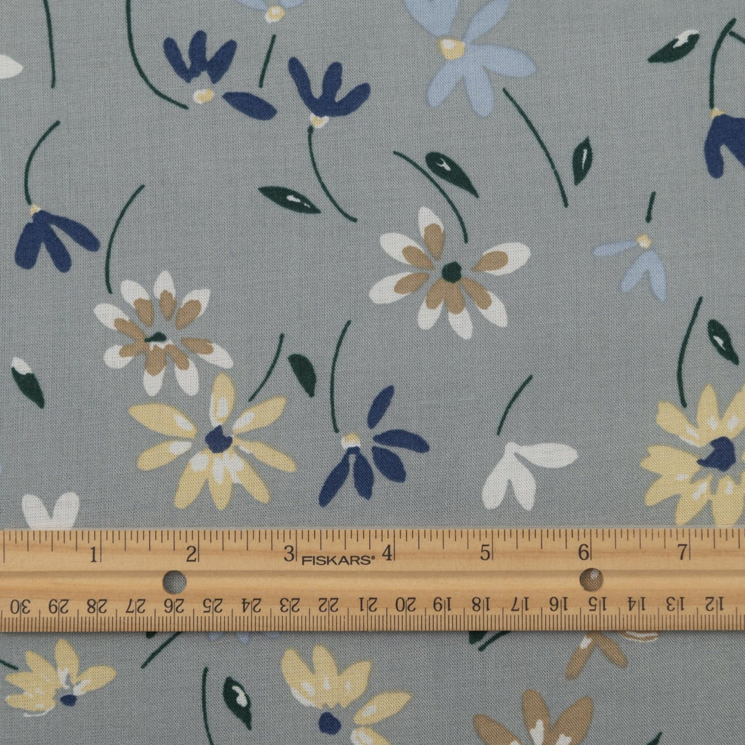 Rayon Challis fabric pale blue with delicate daisy floral print, lightweight and drapey