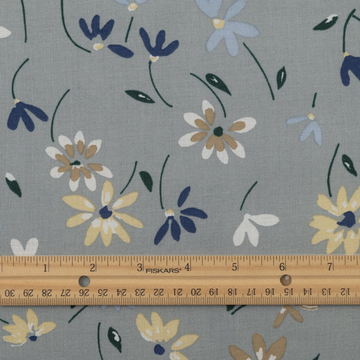 Rayon Challis fabric pale blue with delicate daisy floral print, lightweight and drapey