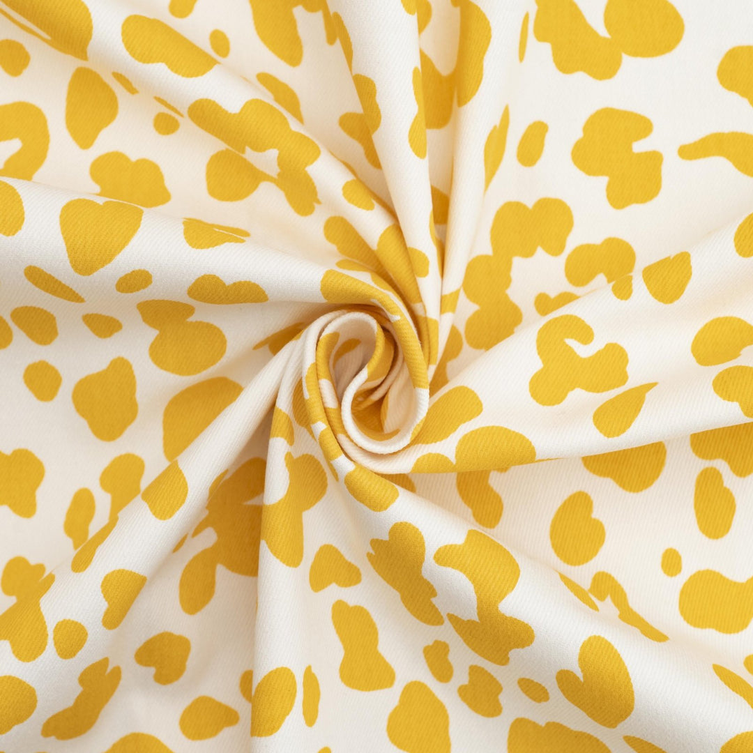 Twill Sunny Splotches cotton spandex fabric with yellow splotches for jackets and skirts