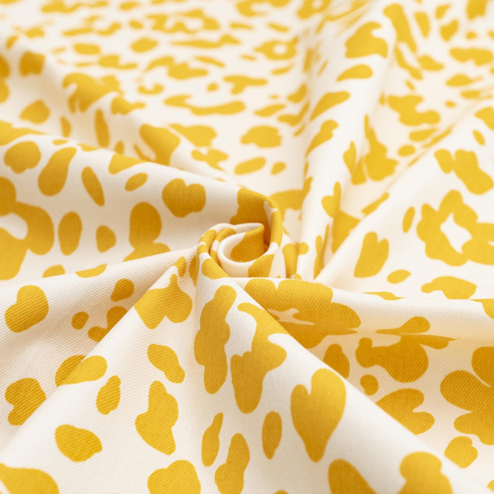 Twill Sunny Splotches cotton spandex fabric with yellow splotches for jackets and skirts